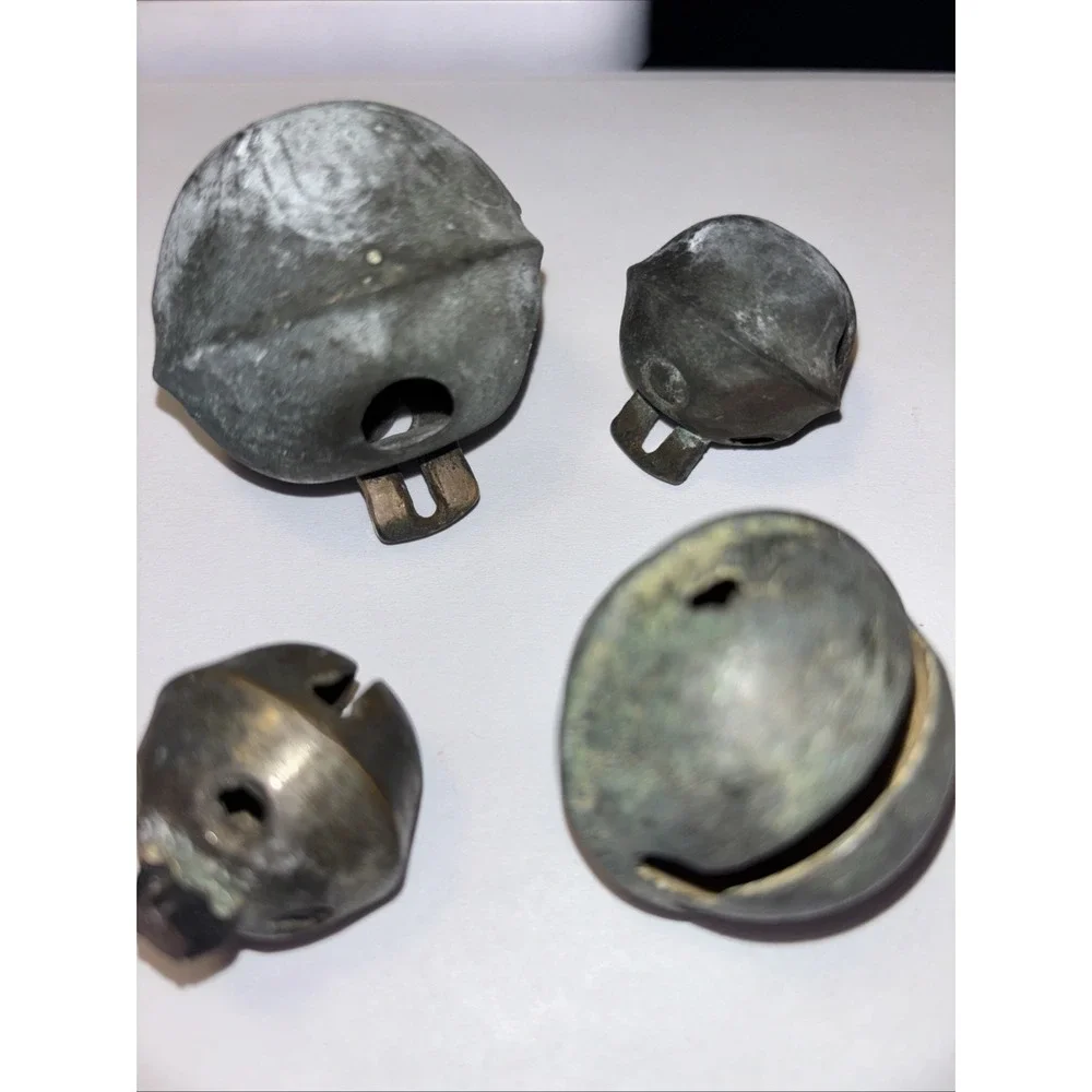 (4) vintage brass petal sleigh bells Shank mount, Not marked. 3778